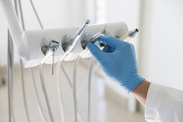 Professional Tooth Extraction technician working in Senoia, GA